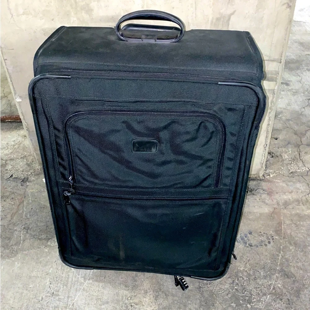 TUMI Check On Suitcase
